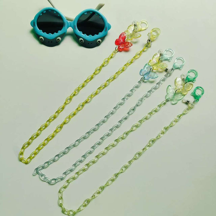 Elegant butterfly necklace and glasses chain for women, a delicate and charming fashion accessory.