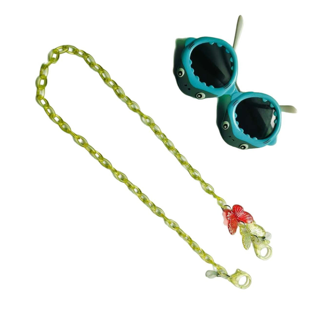 Beautiful green butterfly necklace, a unique women's jewelry piece, doubles as an elegant glasses holder.