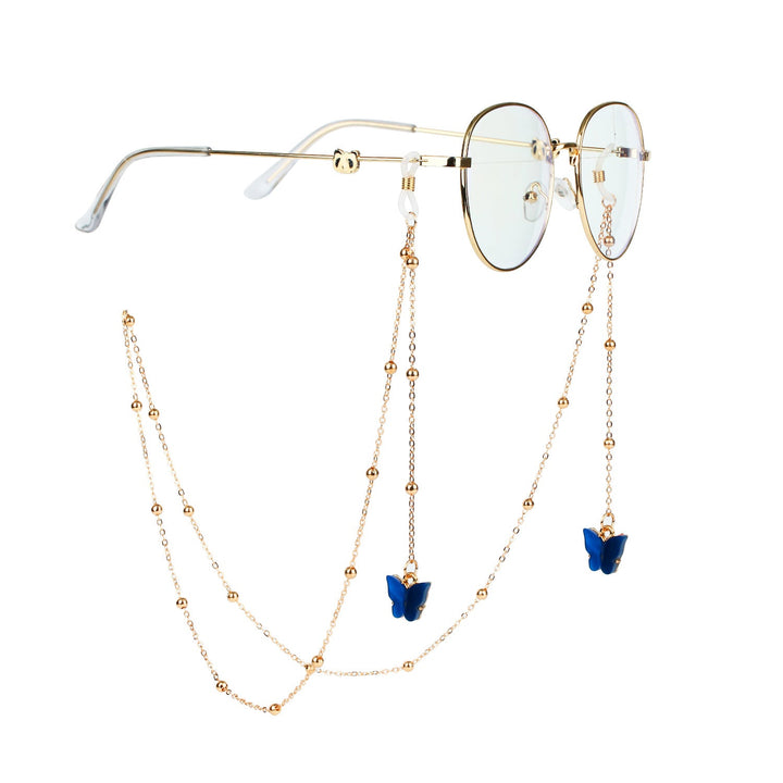 Butterfly charm glasses chain for women, stylish and secure way to hold eyewear.