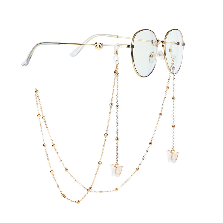 Fashion-forward butterfly sunglasses chain, an elegant accessory for women's eyewear.