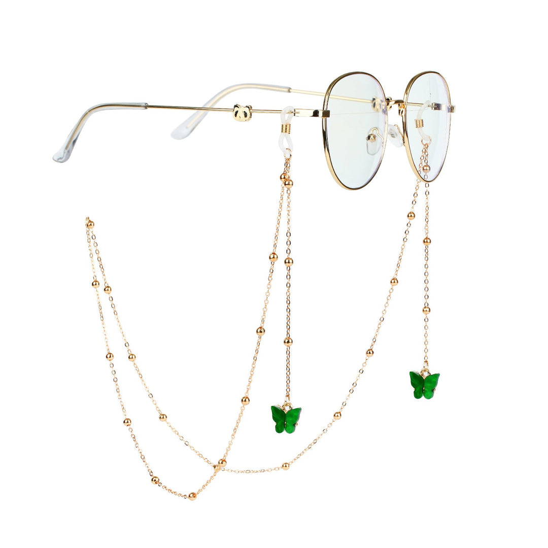 Gold butterfly charm glasses chain, a stylish and practical accessory for women's sunglasses.