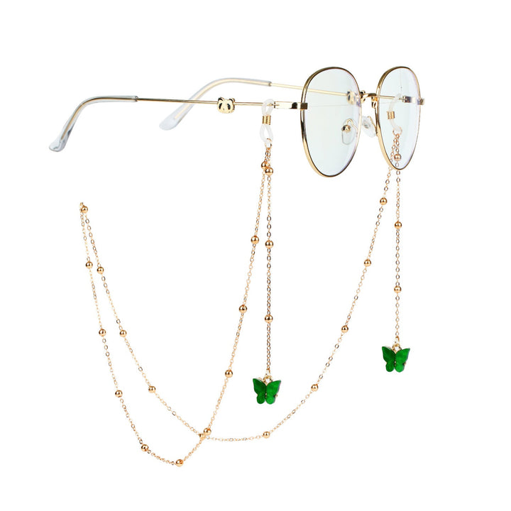 Gold butterfly charm glasses chain, a stylish and practical accessory for women's sunglasses.