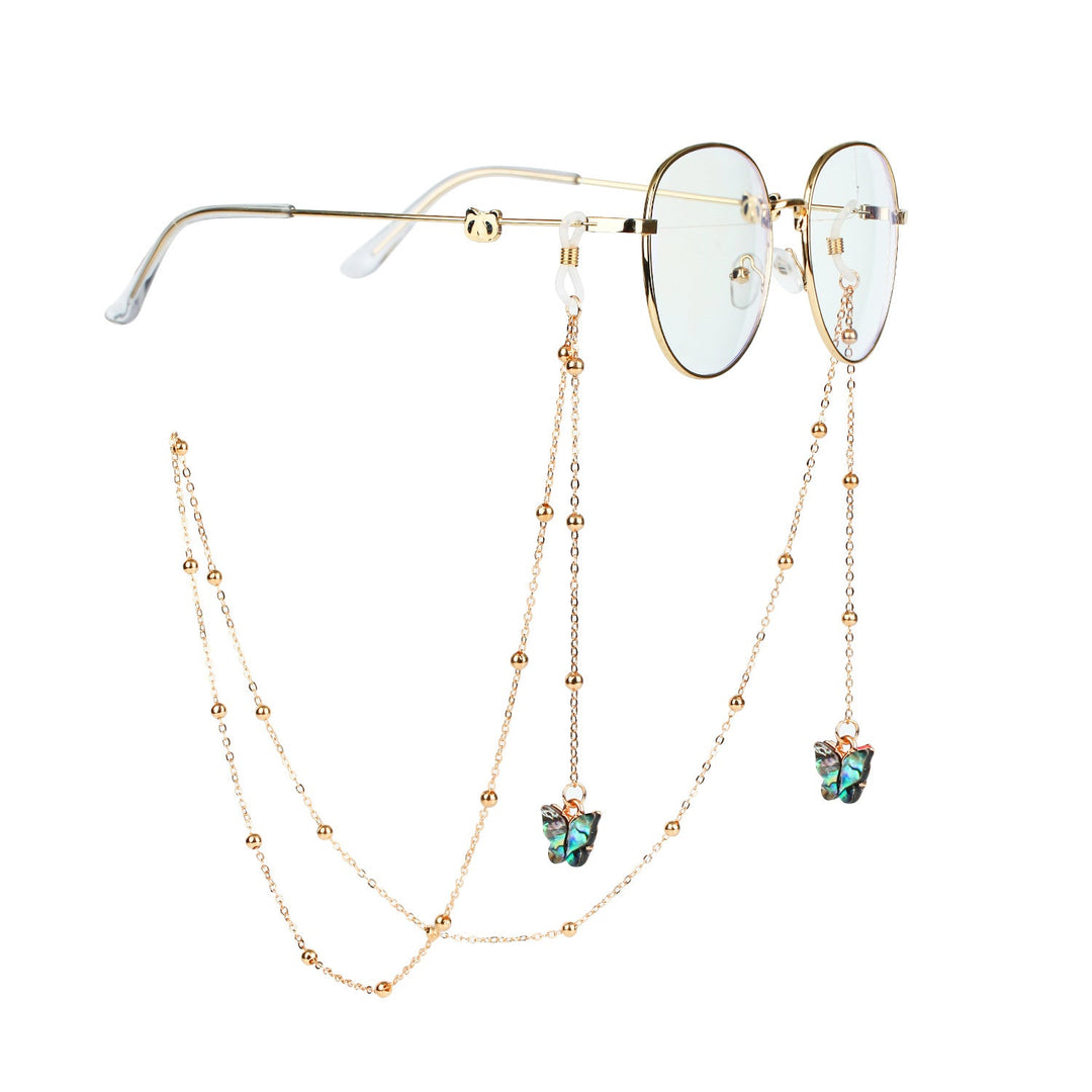 Gold-tone butterfly sunglasses chain, a chic and elegant eyewear accessory for women.