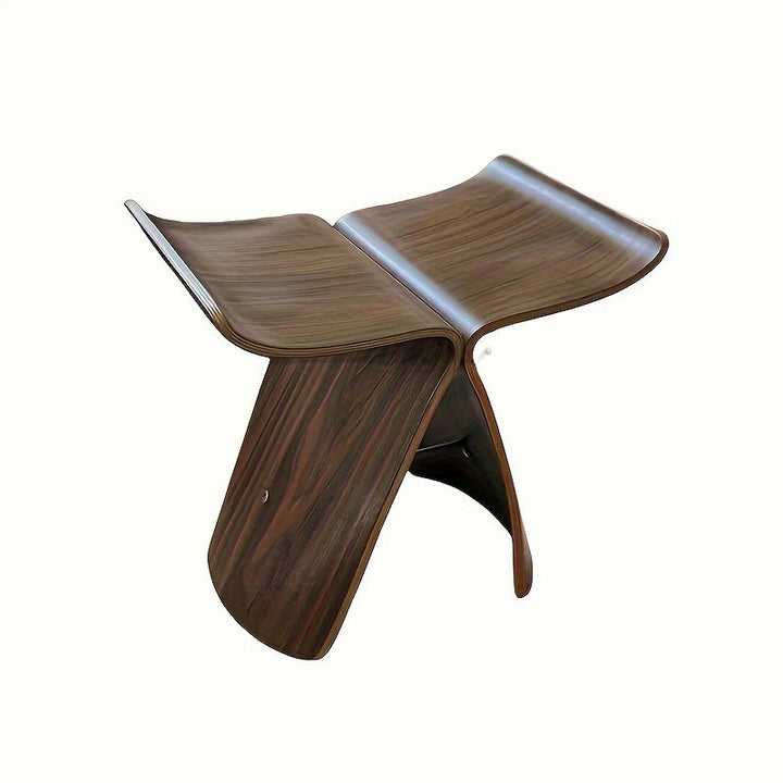 Close-up of elegant butterfly wood stool. Showcases solid wood craftsmanship & modern design.