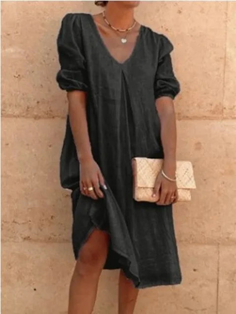 New summer style women's midi dress. Enjoy elegant casual fashion with this comfortable, flowy v-neck, bubble sleeve design.