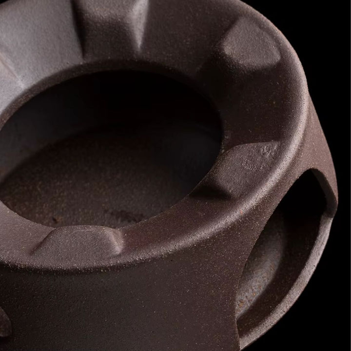 Enjoy hot tea longer with this durable ceramic teapot & reliable tea warmer, essential kitchenware.