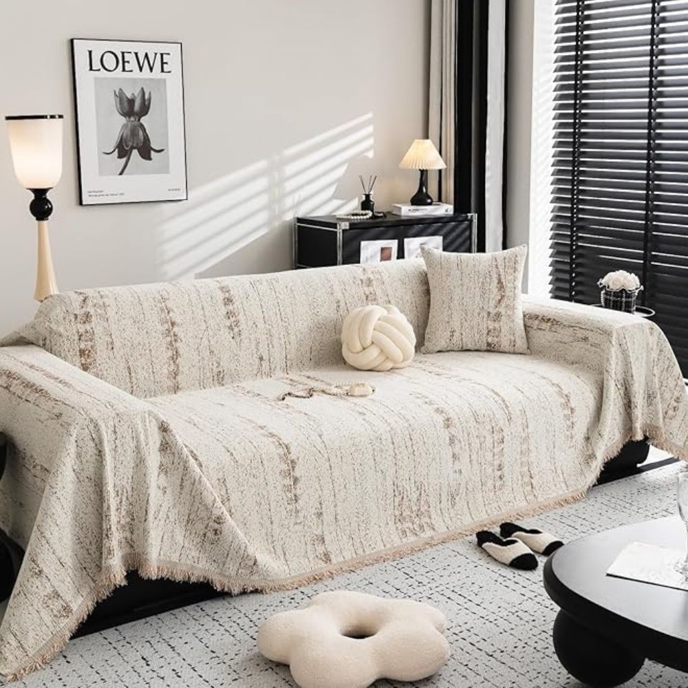 Elegant chenille couch throw & furniture protector, enhancing living room decor with comfort.