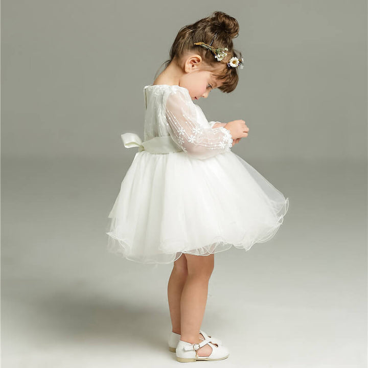Charming toddler girl's elegant polka dot party dress, perfect for special occasions.