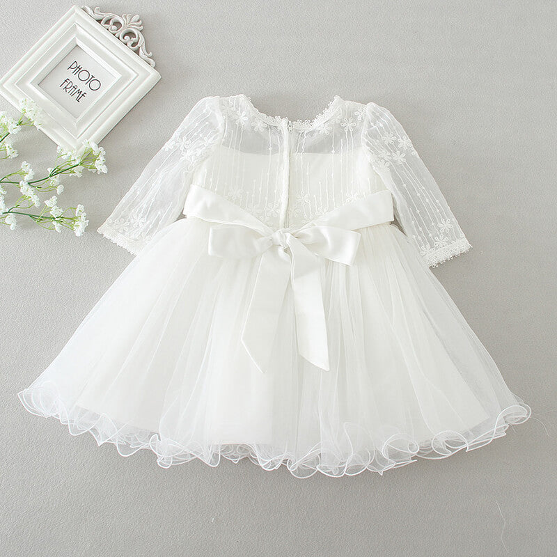 Clara Girls' charming elegant party dress, a special occasion gown with polka dots.