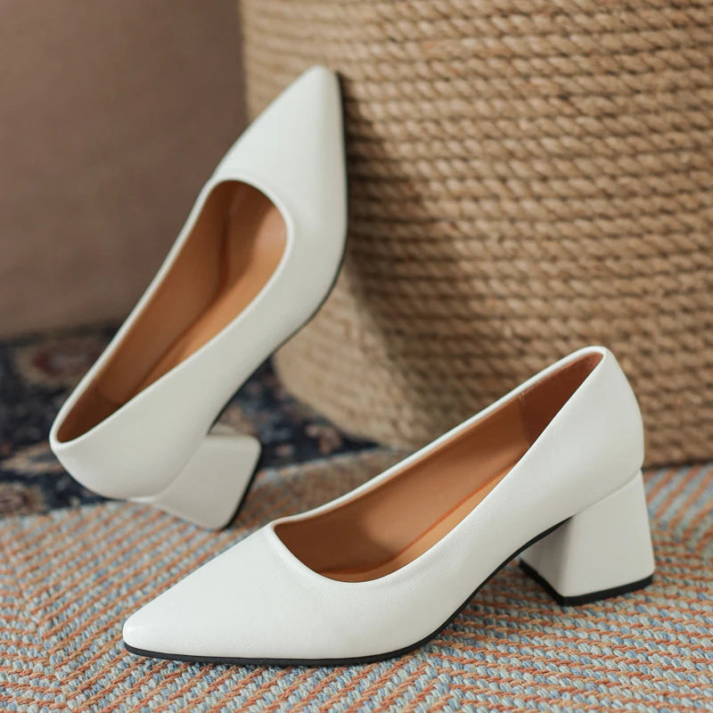 Elegant closed-toe block heels for women, offering all-day comfort and a classic, professional look.
