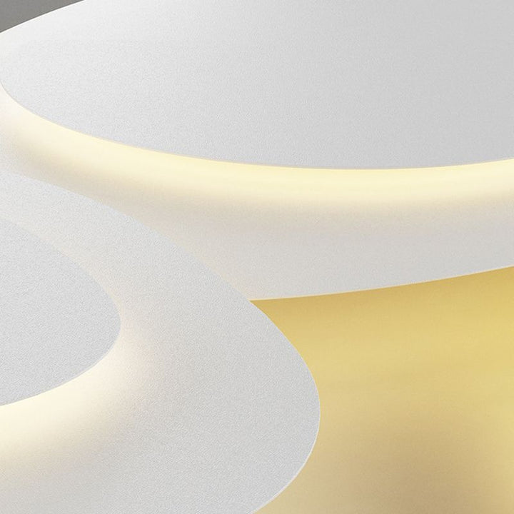 Soft glow LED cloud flush mount, creates serene ambiance in dining rooms.