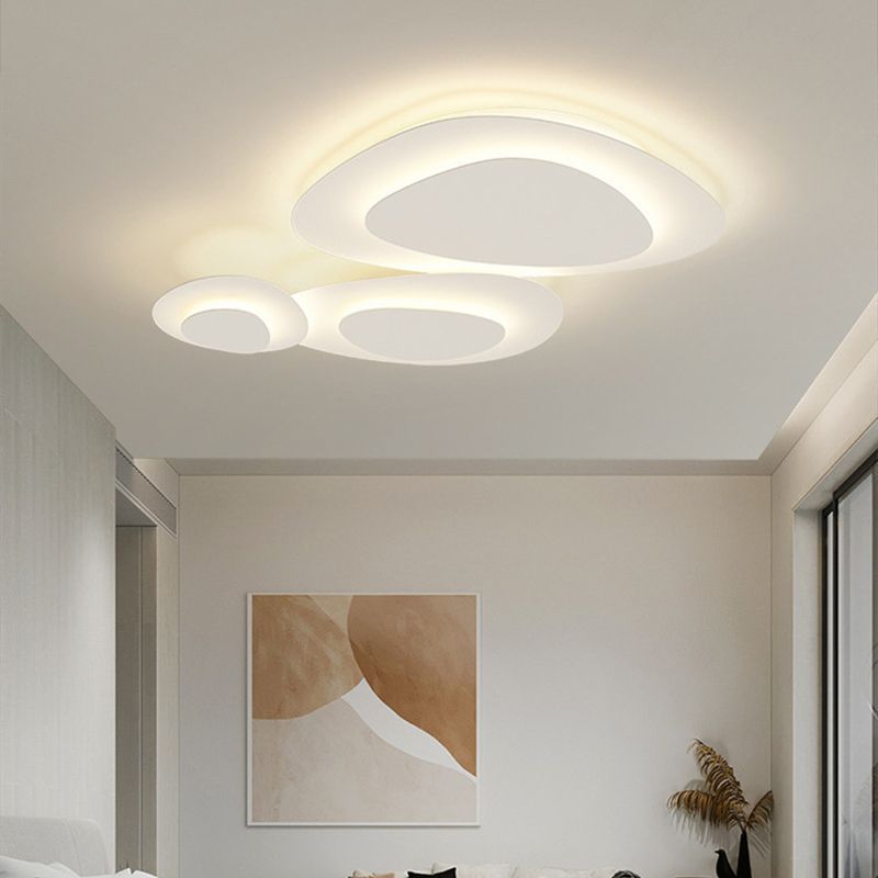 Unique cloud design LED flush mount, offers dimmable warm/white light.