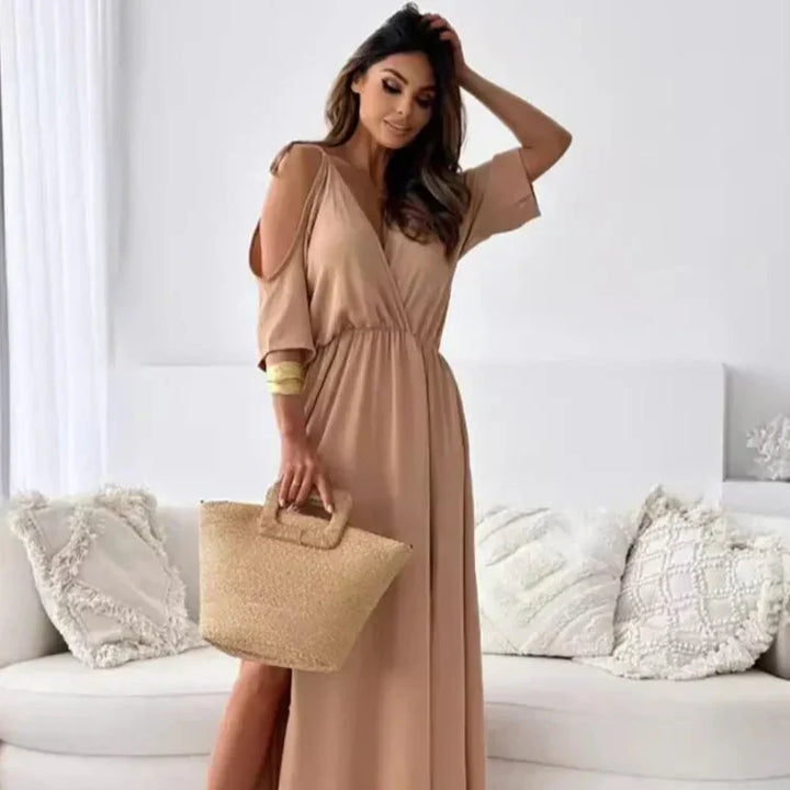 Elegant cold-shoulder maxi dress for women, perfect for summer parties. Flowy and feminine style.