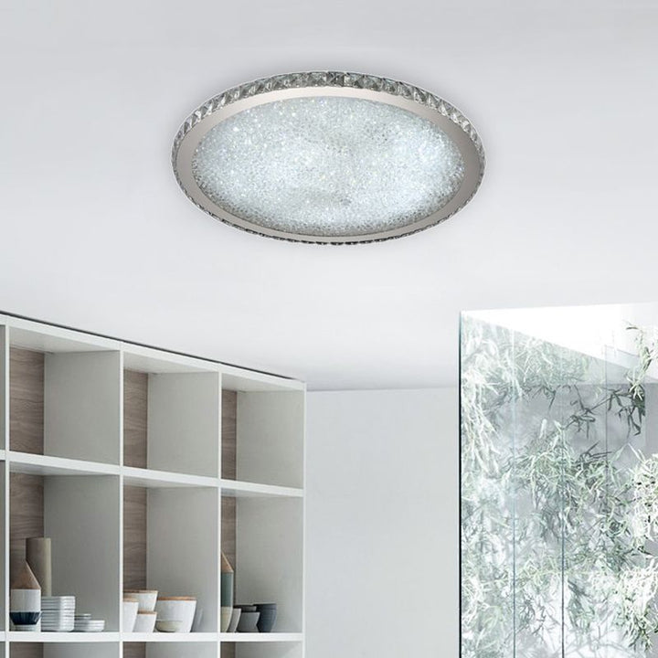 Decorative crystal LED ceiling light, elegant round flush mount for modern homes.