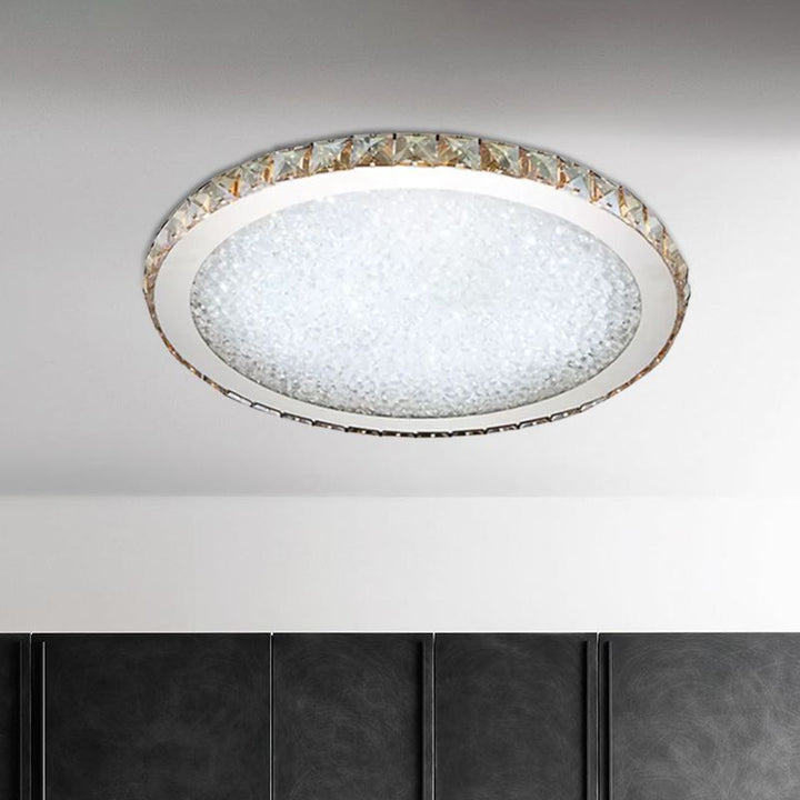 Sparkling crystal round ceiling light, modern LED flush mount fixture for elegant homes.