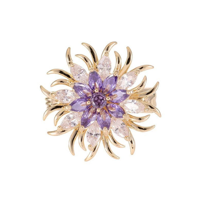 Women's sparkling crystal sun motif brooch, gold-tone metal, elegant fashion pin for dresses.