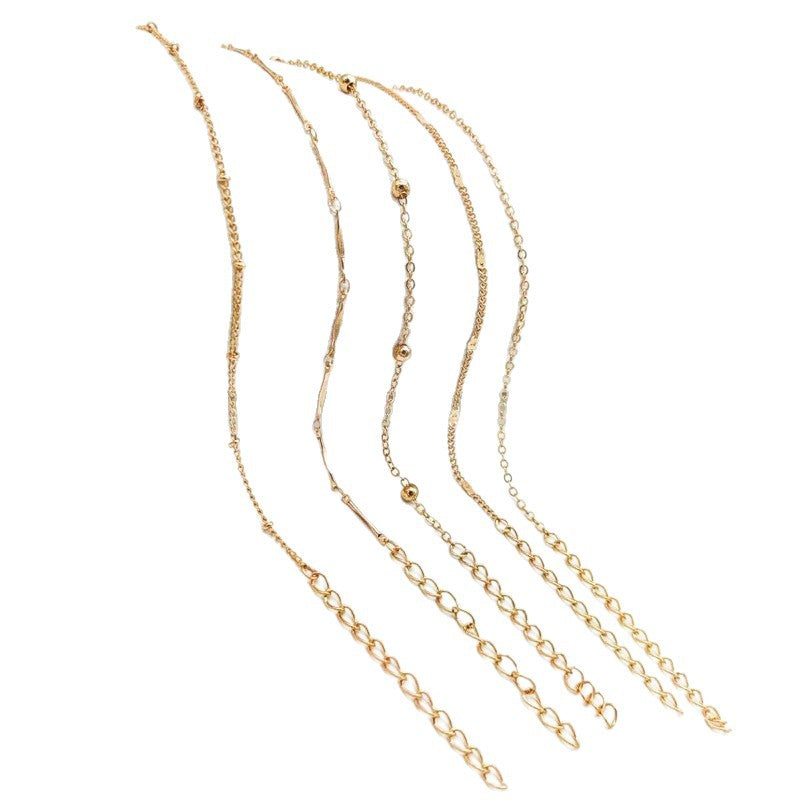 Minimalist dainty chain anklet for women. Elegant and adjustable foot jewelry, a subtle touch of style.