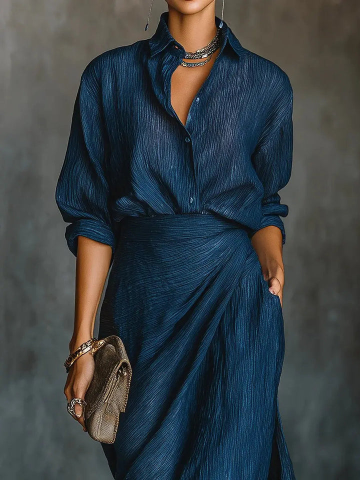 Women's modest dark blue V-neck maxi dress with long sleeves. Ideal for elegant casual-formal occasions & versatile fashion.