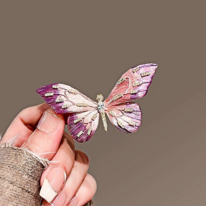 Sparkling women's butterfly brooch. Elegant jewelry gift pin for dresses or scarves.