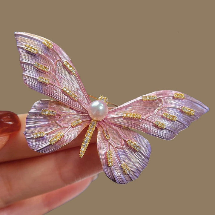 Close-up of sparkling light purple butterfly brooch, an elegant women's jewelry pin.