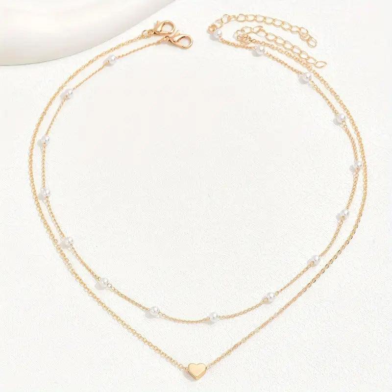 Modern yet classic double layer pearl necklace for women. Elegant fashion jewelry, ideal for any outfit.