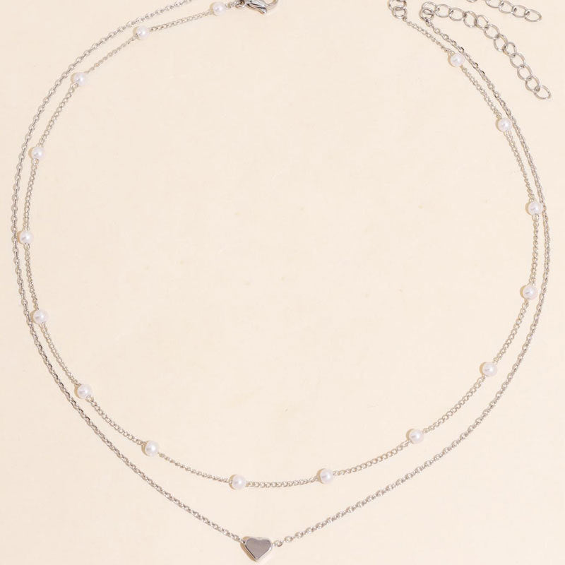 Luxurious double layer pearl necklace. An elegant women's fashion accessory, a stunning statement piece.