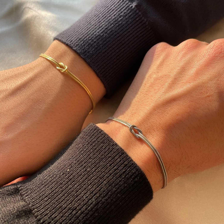 Elegant dual-strand knot bracelet for women, a sophisticated fashion accessory.