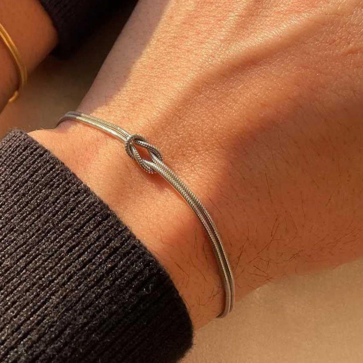 Sophisticated dual-strand knot bracelet, a must-have women's elegant fashion jewelry piece.
