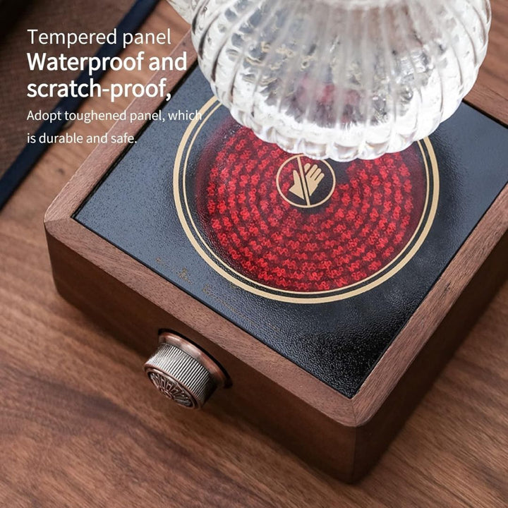 Durable walnut base electric tea warmer offering adjustable temperature for consistently hot home beverages.