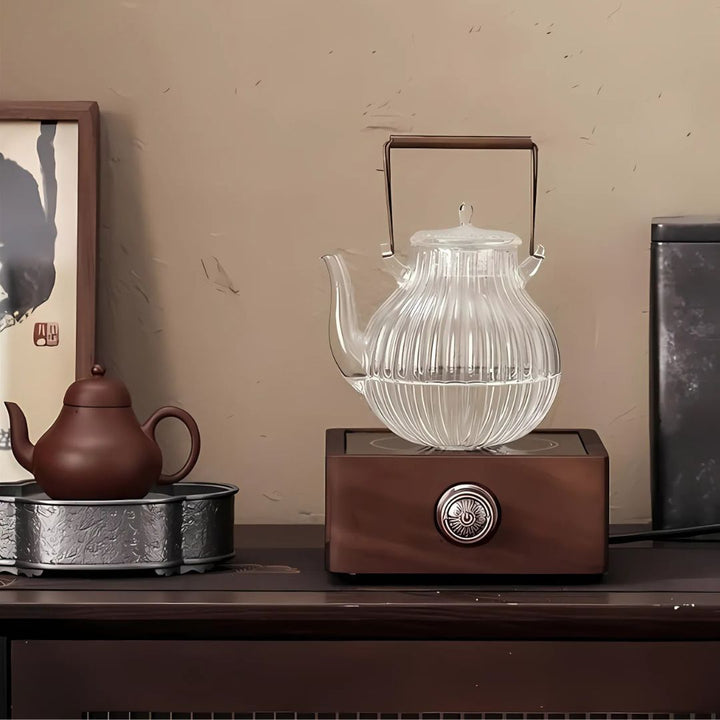 Walnut base electric tea warmer with easy adjustable temp for a personalized hot beverage experience at home.