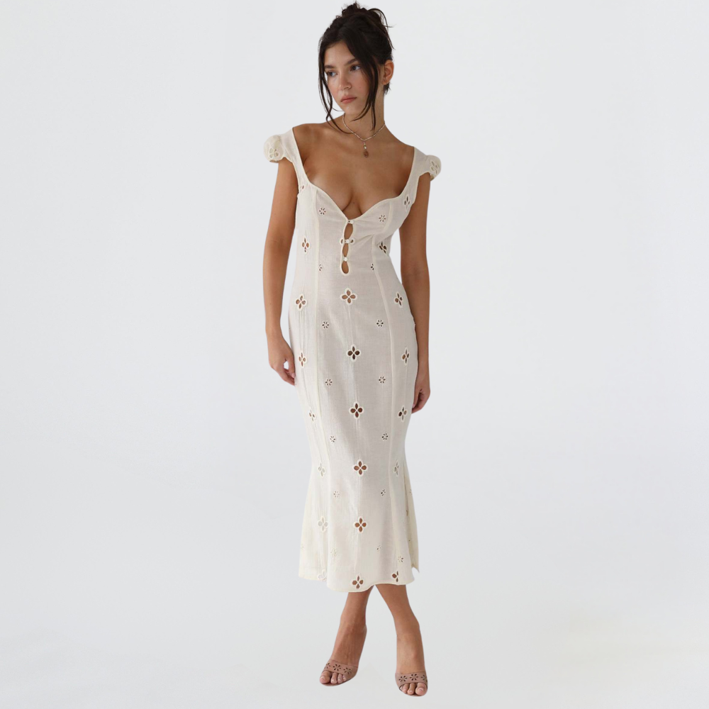 Women's elegant embroidered mermaid wedding dress with stylish puff sleeves.