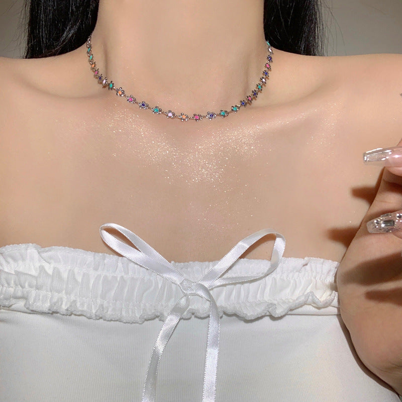 Elegant floral charm choker necklace for women, a sophisticated fashion accessory.