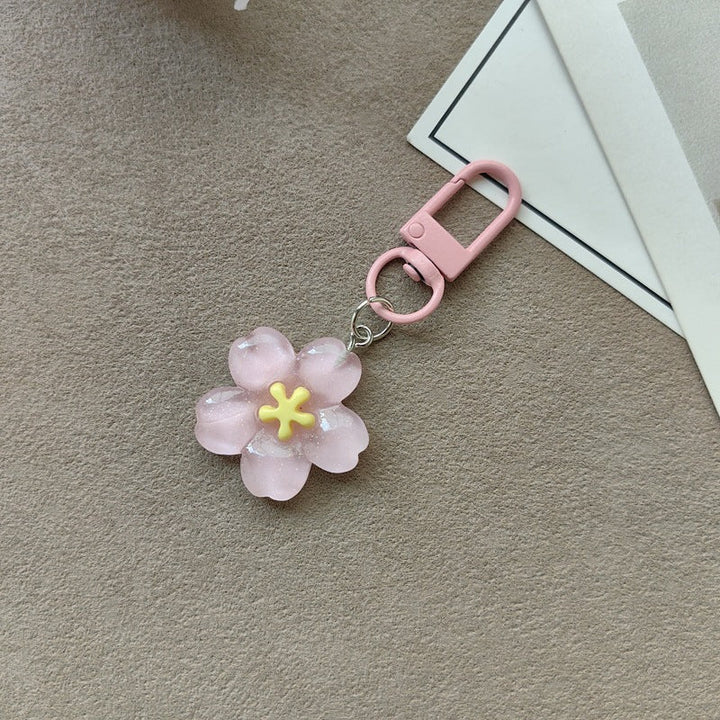 Fashionable floral key ring, an elegant accessory for women's keys and purses.