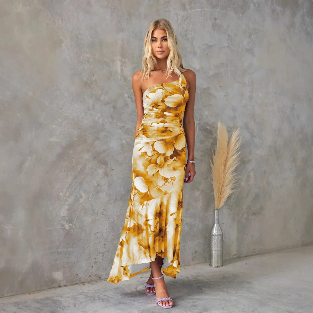 Women's colorful floral midi dress, elegant one-shoulder ruched style, flowy for warm weather.
