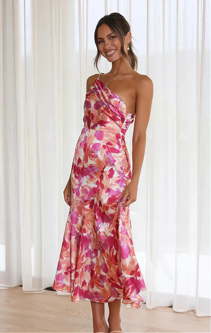Women's vibrant floral print satin maxi dress with a chic one-shoulder design. Ideal evening wear.
