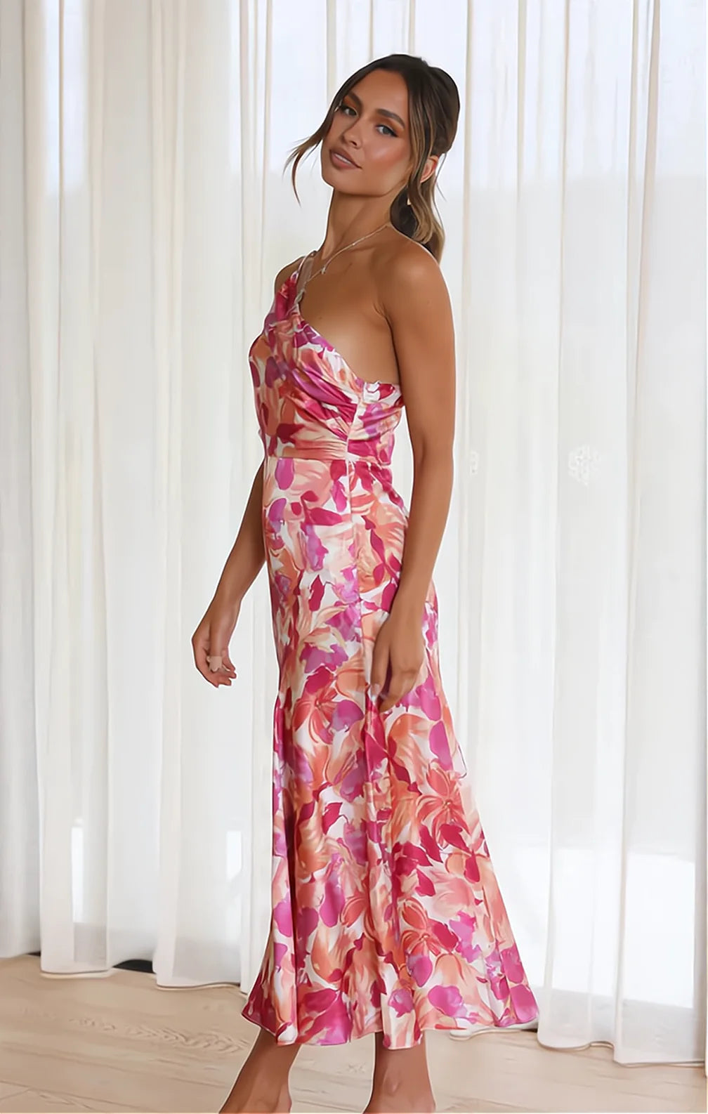 Formal one-shoulder floral satin gown. An elegant choice for wedding guests, prom or gala events.