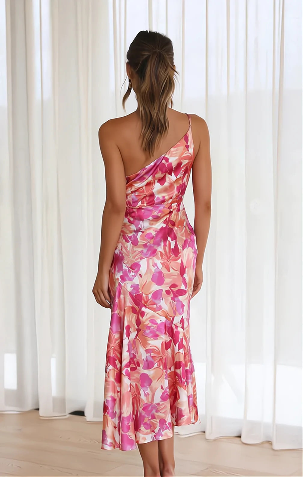 Maxi length floral satin gown with a single shoulder strap, exuding elegance for any special event.