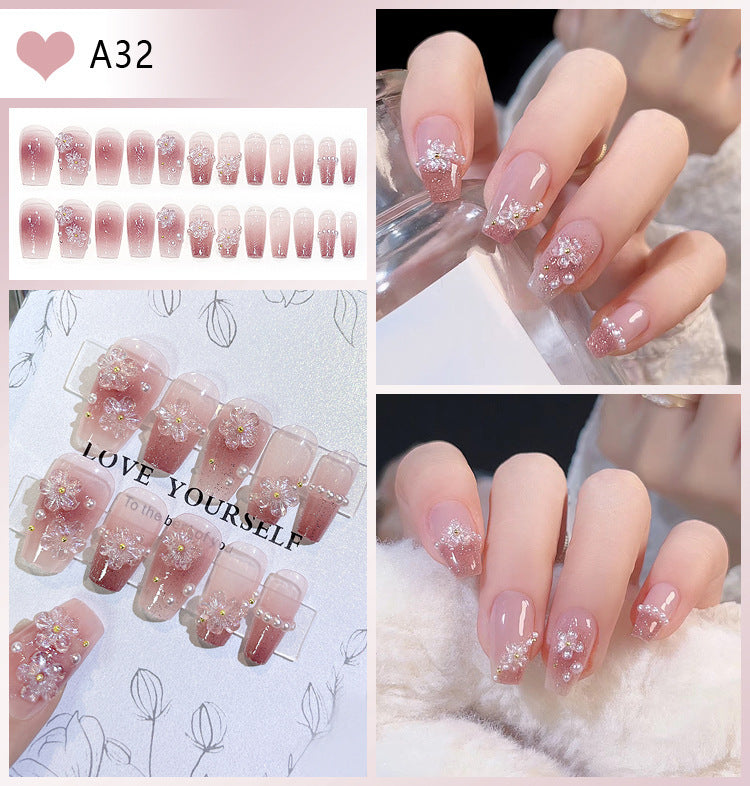 Elegant floral press-on nail tips for women, offering instant glamour & stylish manicure. Perfect fake nail art.