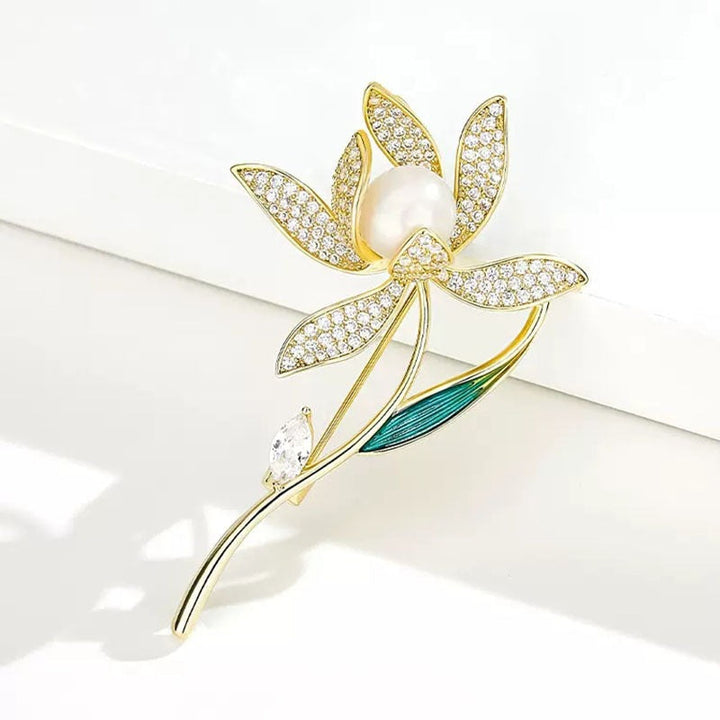 Exquisite floral design brooch with dazzling rhinestones and pearls, a sophisticated women's jewelry piece.