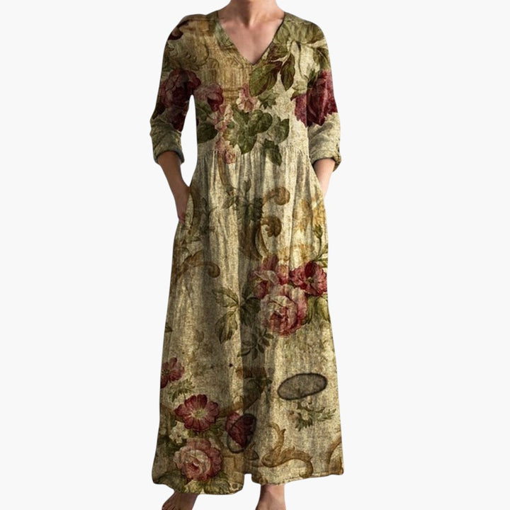 Chic women's V-neck maxi dress featuring an elegant floral design, perfect for summer fashion.