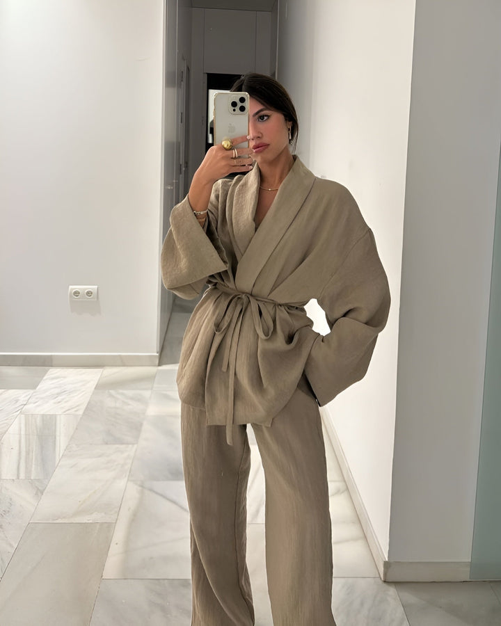 Women's versatile khaki two-piece set featuring a flowing kimono-style top & matching pants. Casual chic summer outfit.