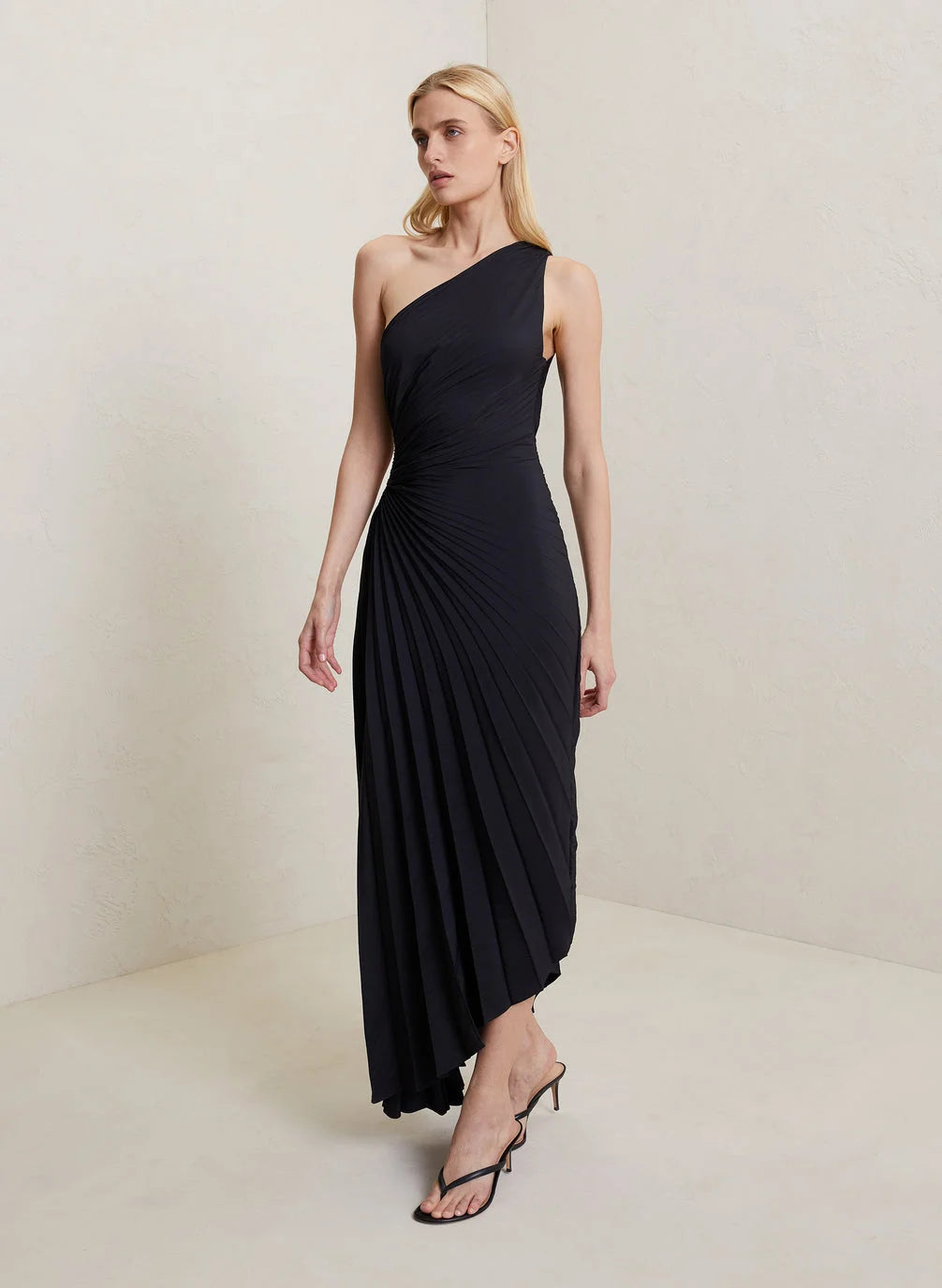 Stylish long elegant flowing maxi dress, perfect for women's occasion wear. A versatile summer dress.