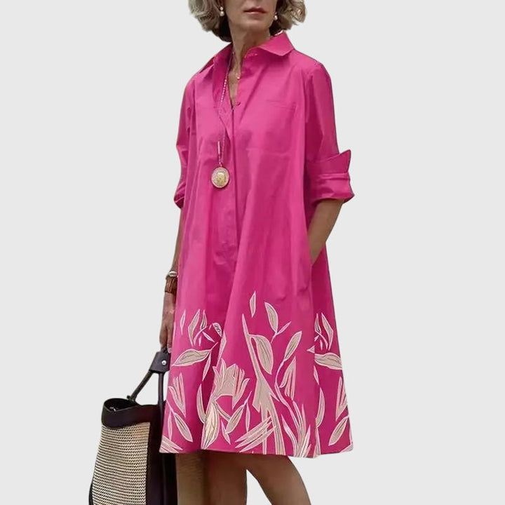 Chic women's elegant dress with pockets. Flowy design offers comfortable versatility for summer & spring fashion.