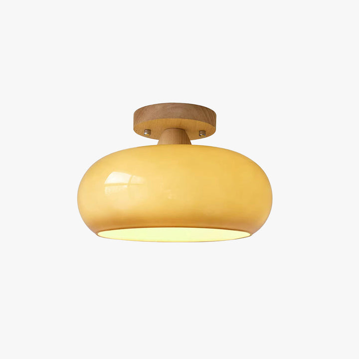 Elegant flush mount ceiling light featuring a natural wood frame & frosted glass shade for ambient home lighting.