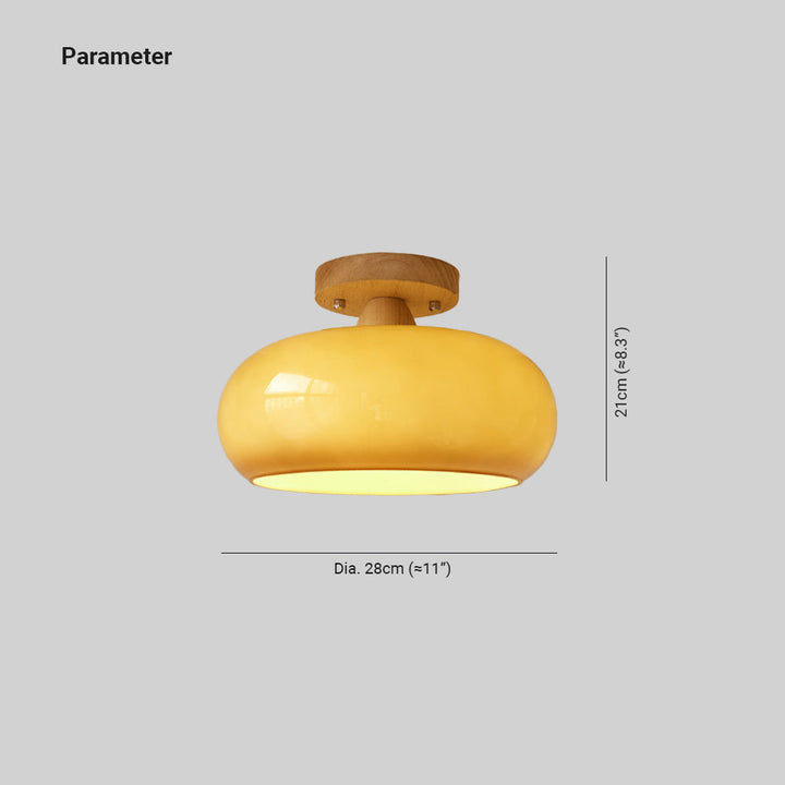 Beautiful wood & glass flush mount light, offering a soft glow. Ideal for modern home decor, enhancing ambiance.