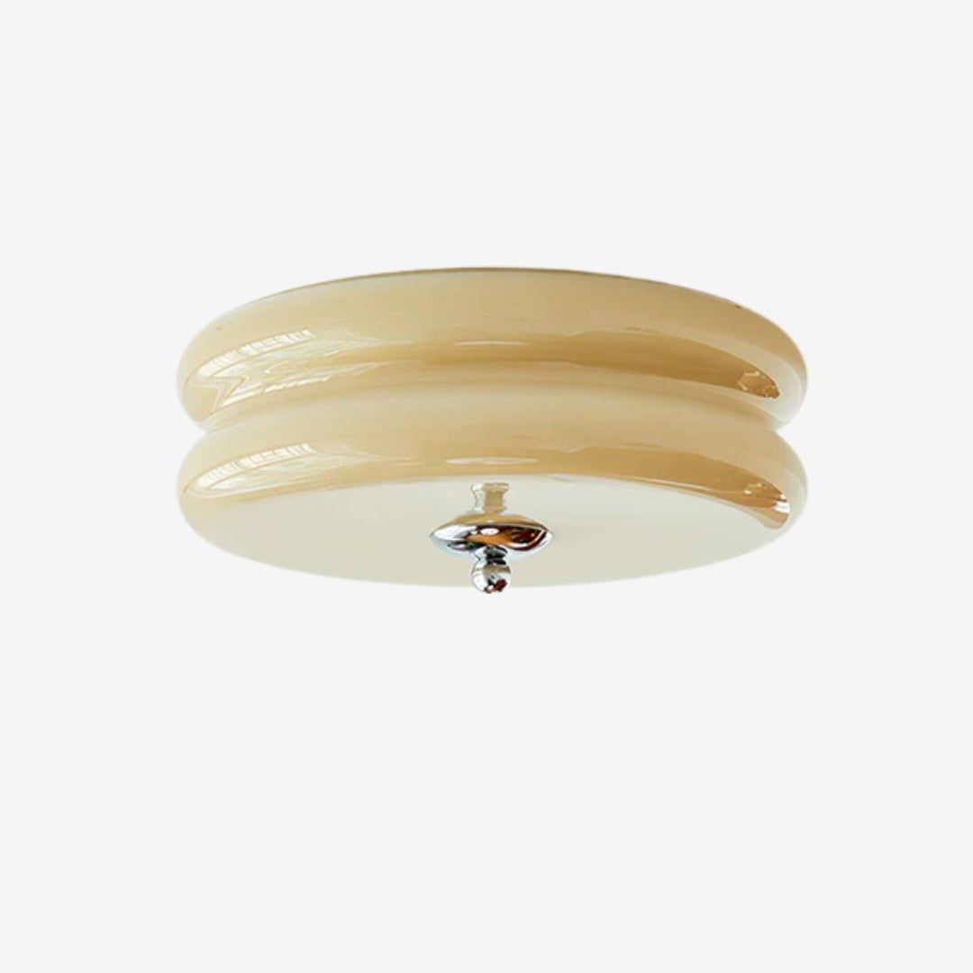Elegant fluted glass LED ceiling light with gold finish for living room decor.