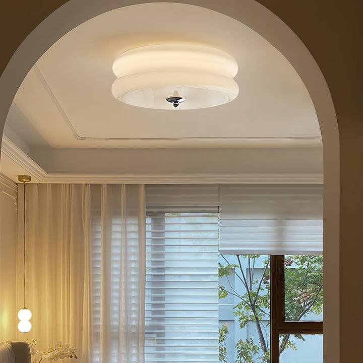Stylish fluted glass LED ceiling light, dimmable for versatile use.