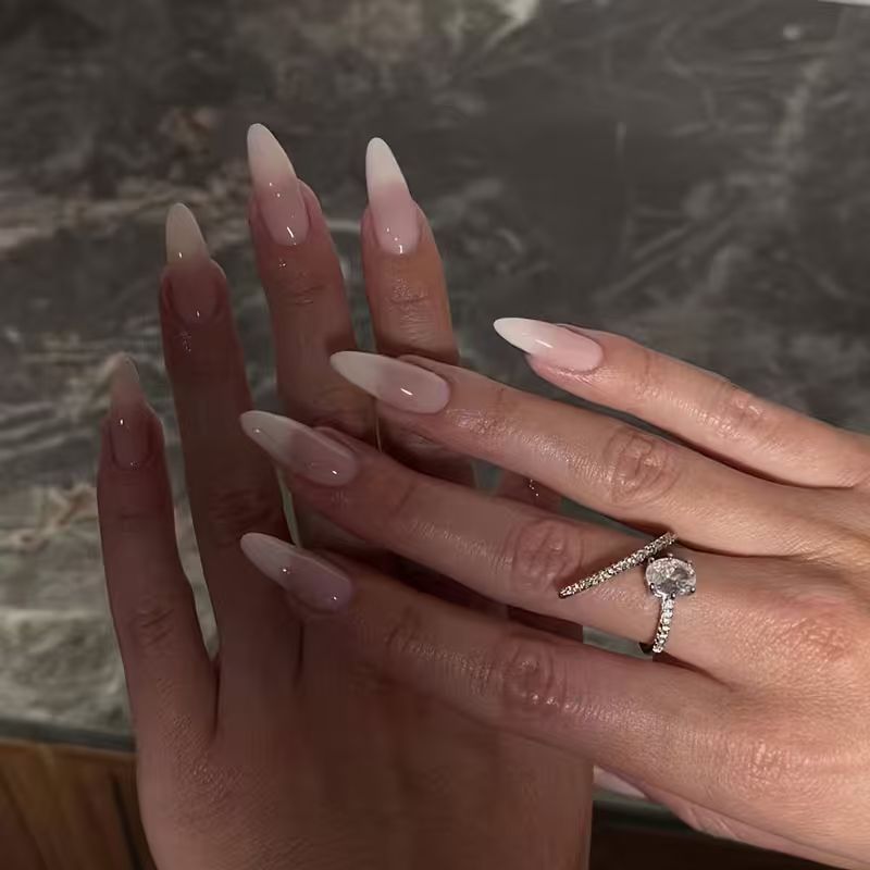 Elegant French ballet press-on nails for women, perfect for a quick & stunning manicure.