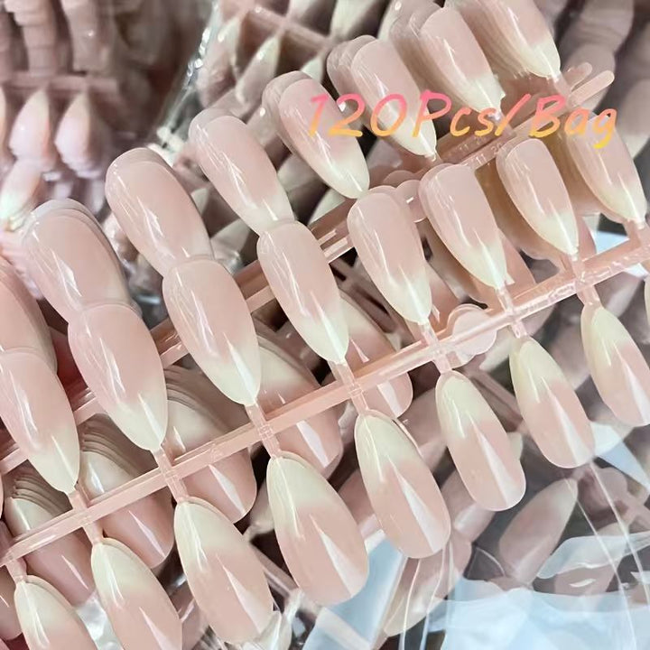 Elegant French tip press-on acrylic nails for women, perfect for a quick, salon-quality nude manicure. Easy false nails.