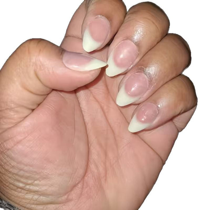 High-quality women's press-on French tip acrylic nails. Achieve a beautiful, elegant nude manicure effortlessly.